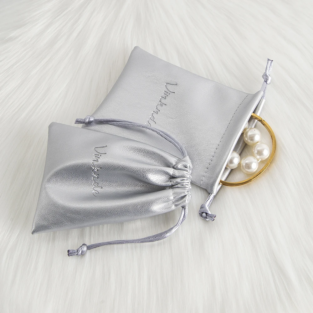 50Pcs Custom Logo Embossed Silver PU Leather Jewelry Bag Ring Earring Bracelet Drawstring Storage Pouch Makeup Travel Dust Sack