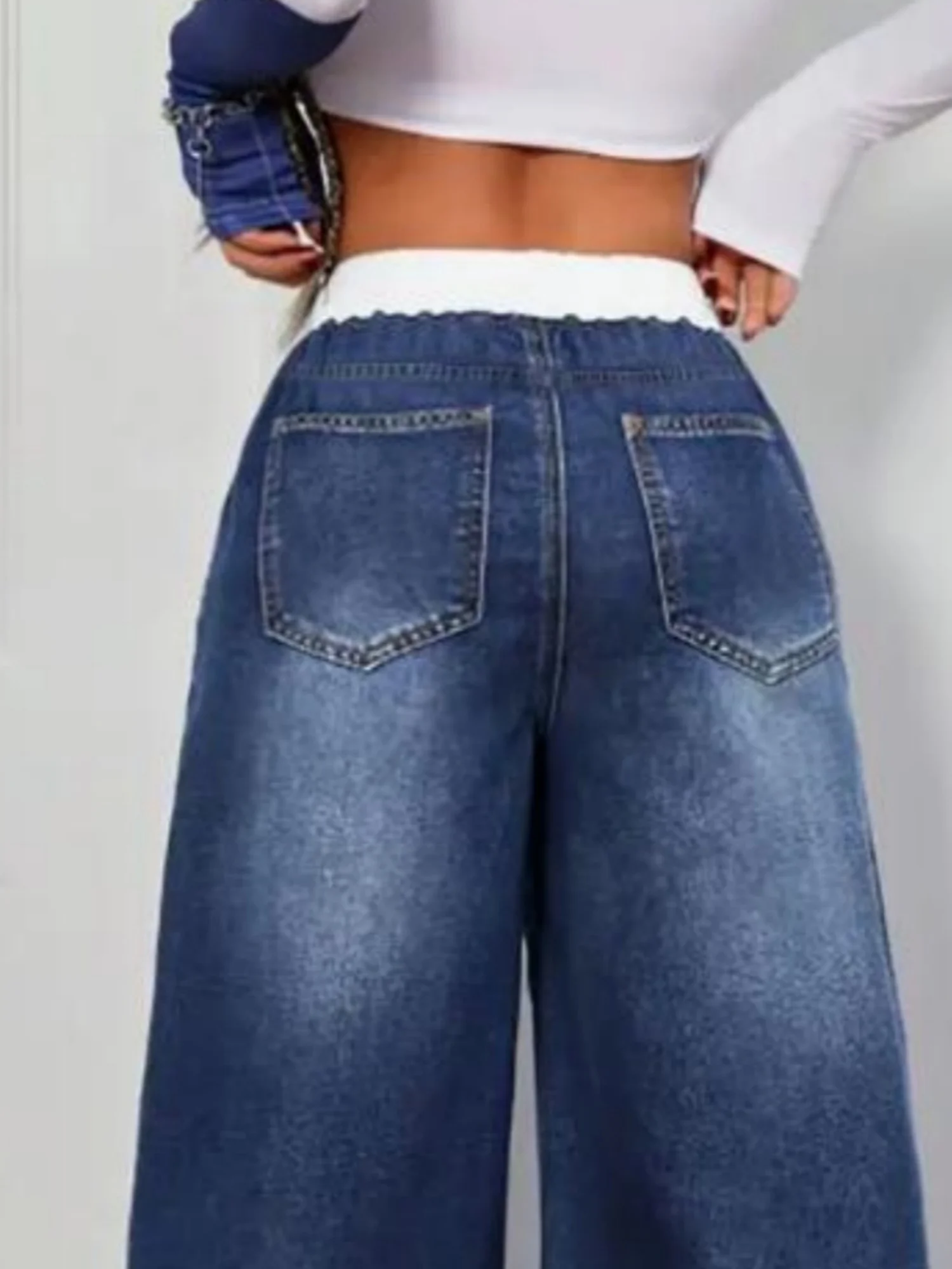 جينز مستقيم الساق بتصميم ريترو للخريف على الطراز الأمريكي بتصميم جديد مريح وواسع الساق للنساء من قماش الدنيم