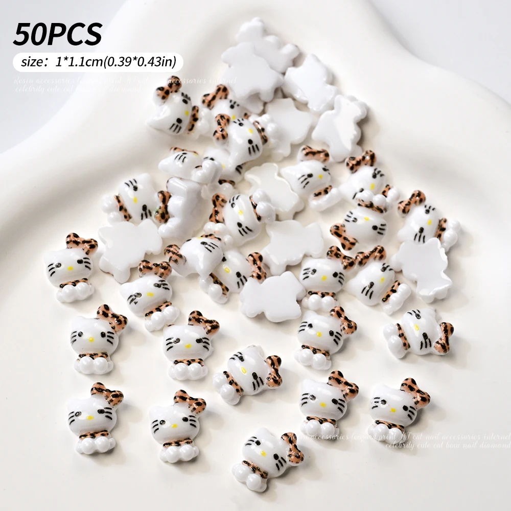 50 Teile/beutel 3D Sanrio Leopard Hallo Kitty Nail art Charms 10*11mm Nette Leopard Bowknot Kitty Nagel Dekor japanische & Koreanische KT Teile