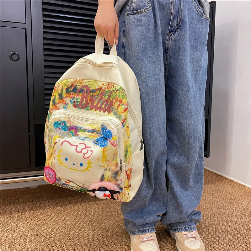 Sanrio Hello Kitty Cartoon Graffiti Fashionable Backpack Sweet Cute Girl Shoulder Bag Anime Printed Student Bookbag