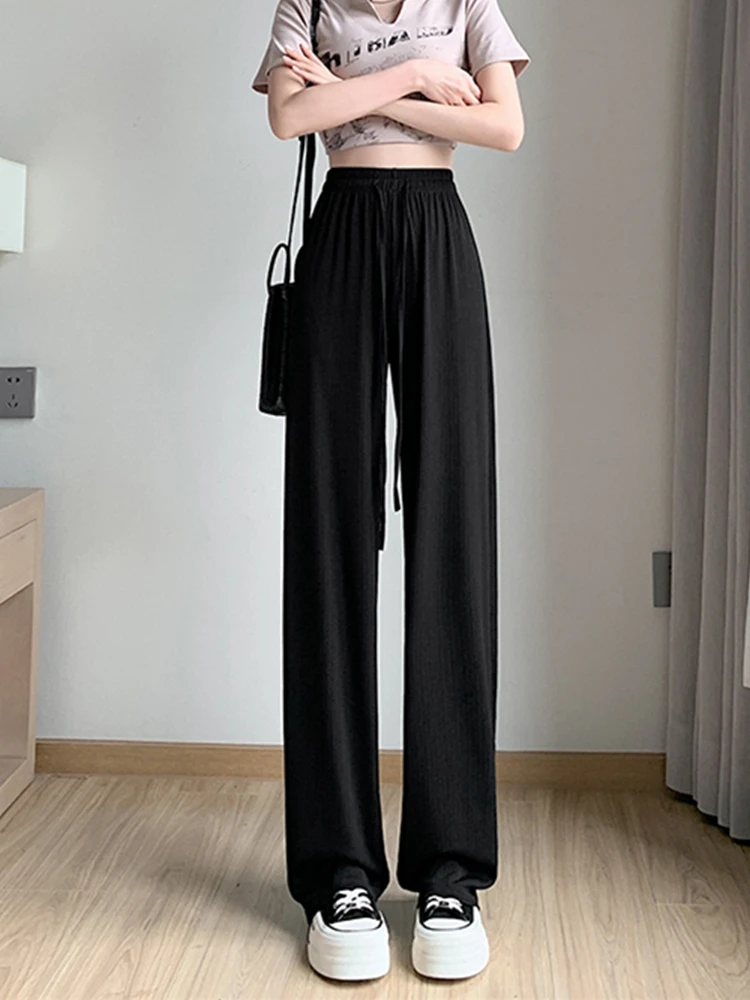 

Широкие брюки из ледяного шелка, женские летние тонкие брюки большого размера для похудения, скрывающие прямые брюки, свободные повседневные студенческие брюки...