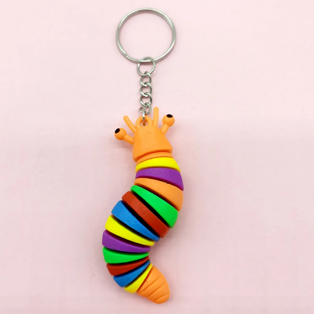 1PCS， New selling caterpillar pendant color soft snail slug key chain. Random color