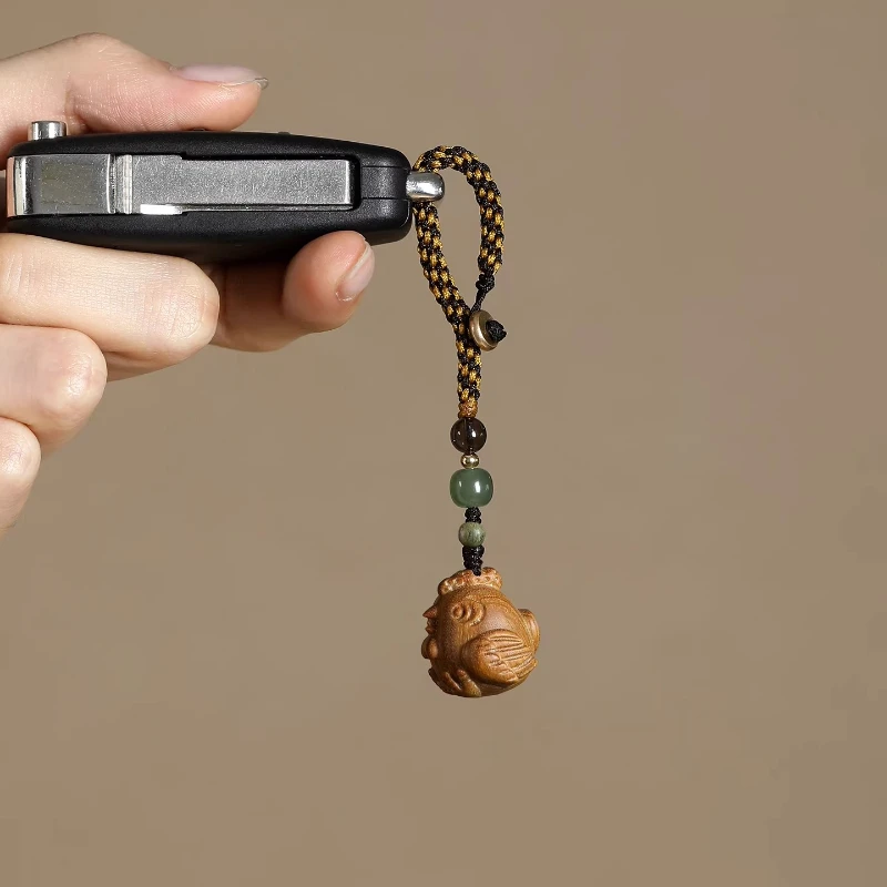 

Hand Carved Green Sandalwood Chinese Zodiac Chicken Pendant Handwoven Strap for Mobile Phones Keys Bags Gifts