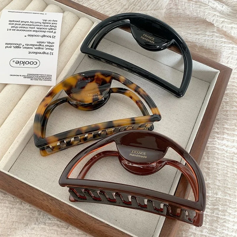 

Korean version of thickened board acetate chocolate color large disc hair shark clip grab clip