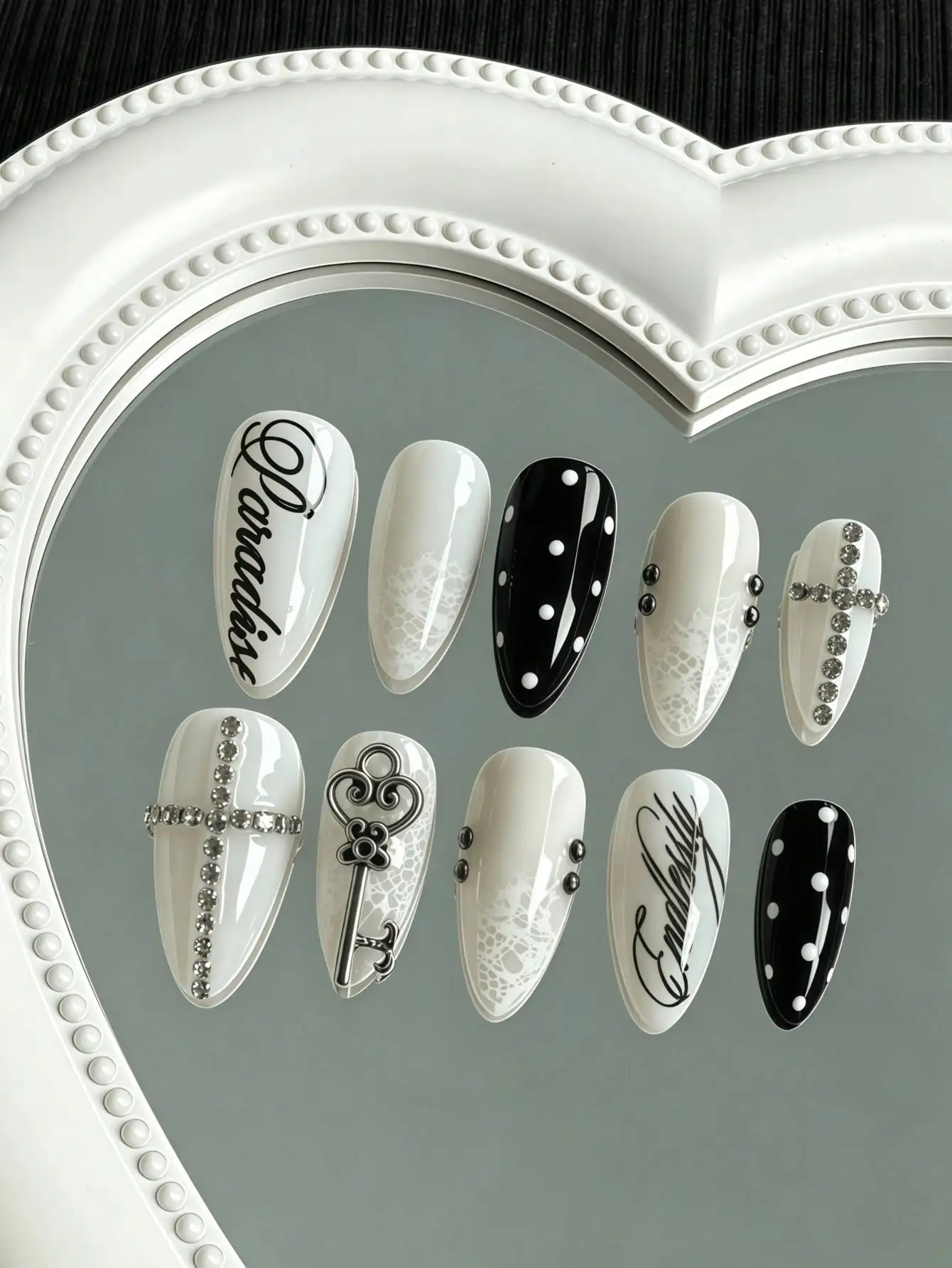 10 pieces of handmade almond-shaped full-cover nail tips, medium-long in length, featuring a black, white, and beige color scheme with hand-painted polka dots, letters, and 3D key and rhinestone decorations, in a sweet and cool retro style, suitable for women and girls, ideal for concerts and music festivals, suitable for autumn and winter, perfect for personalized outfits, and also suitable as a gift, comes with 1 piece of jelly glue and 1 nail file
