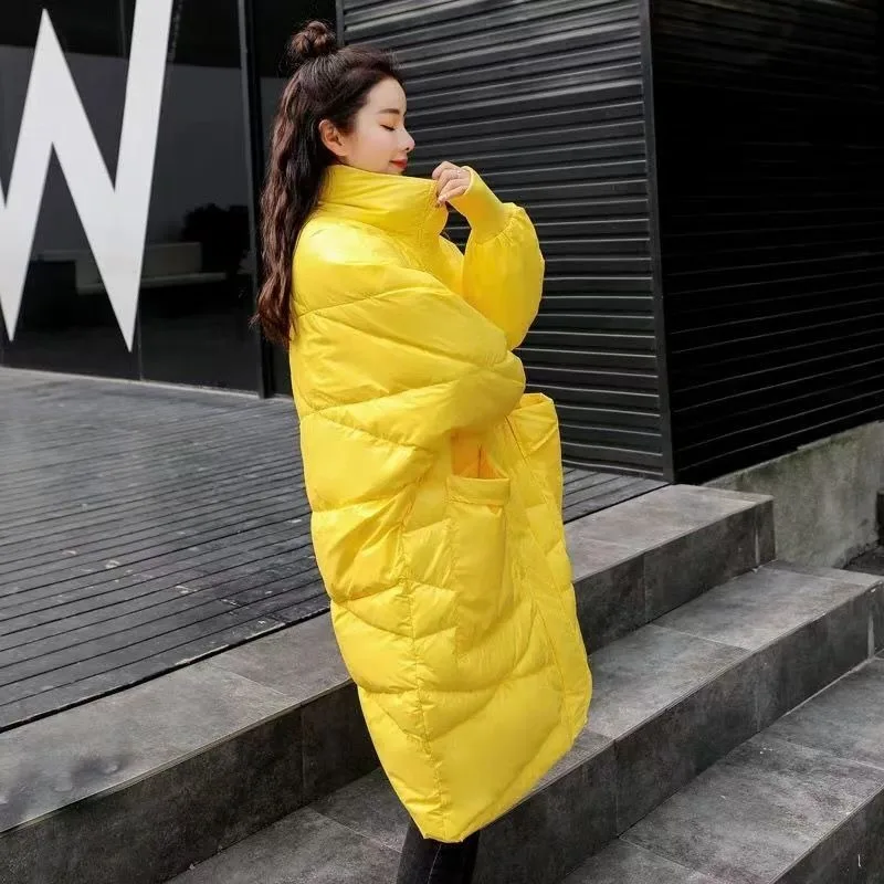 Piumino in piumino d'anatra bianco giallo lucido di fascia alta da donna medio e lungo invernale versione coreana ampia e sottile personalizzata da strada