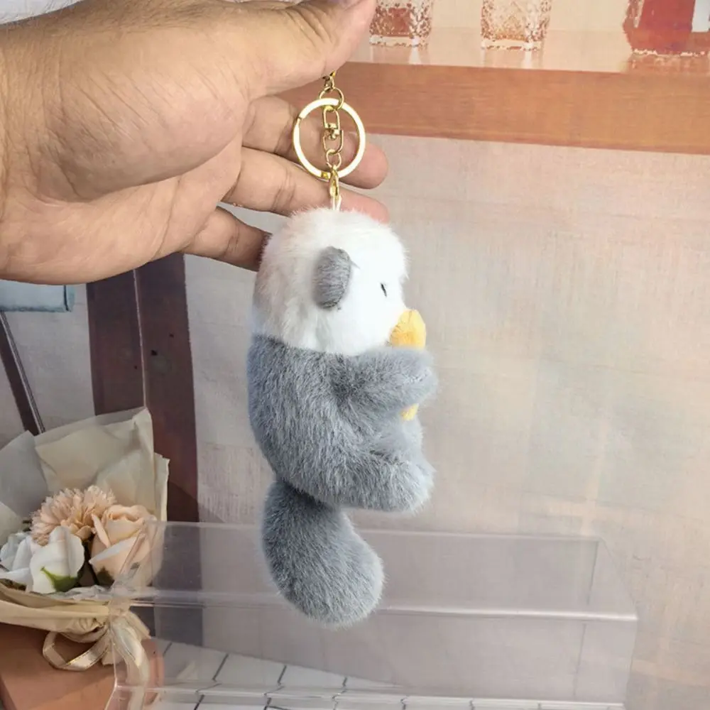 Decorations Holding Fish Cartoon Otter Keychain Fluffy Soft Plush Otter Bag Pendant Creative Stuffed Otter Plush Keyring Unisex