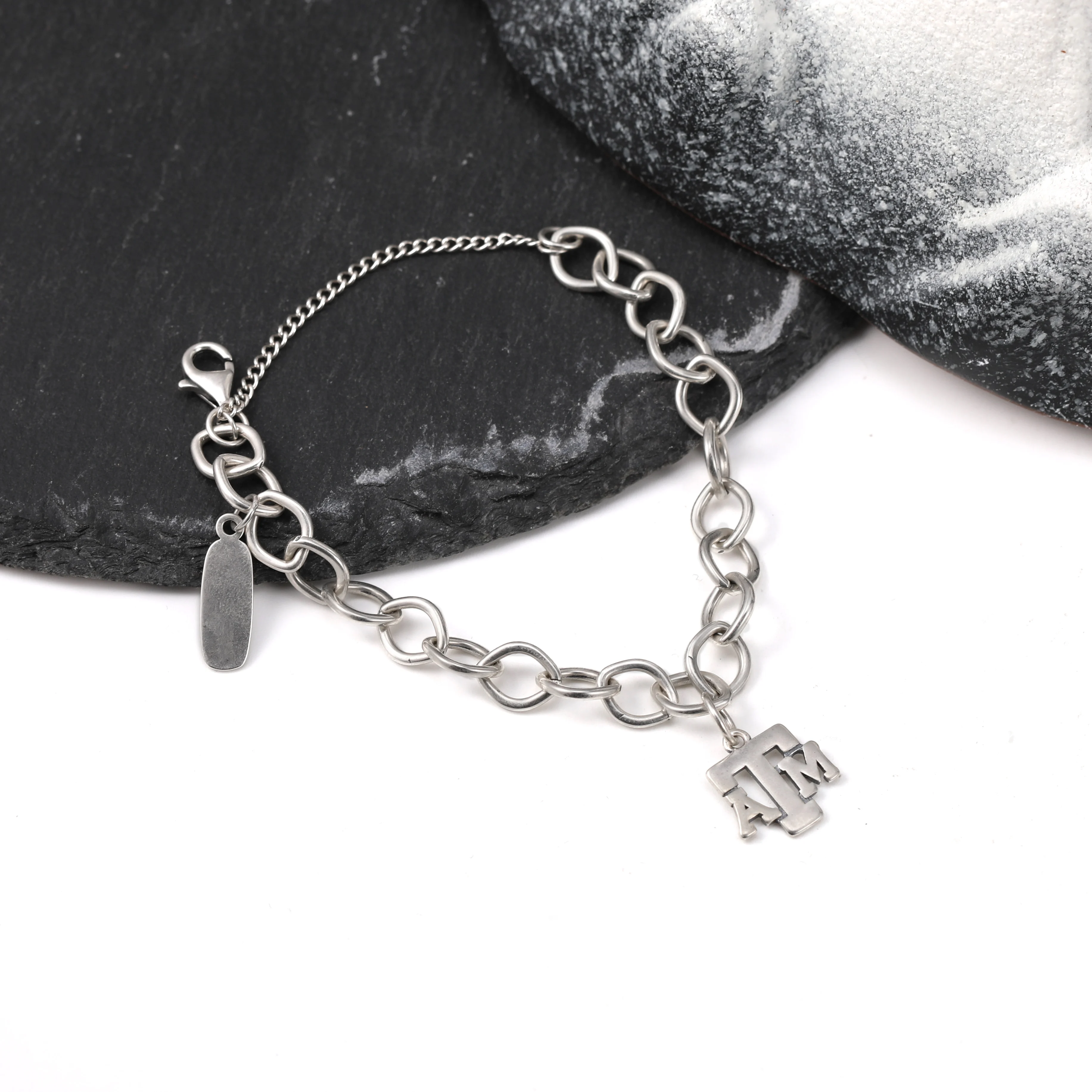 

Genuine 925 sterling silver Forged Link Charm Bracelet paired with a Texas A&M University pendant