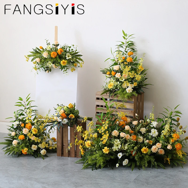 برتقالي أصفر وردي أخضر يترك ترتيب الزهور لإطار الزفاف خلفية الحدث الجدول المركزية الكرة الطابق زهرة صف