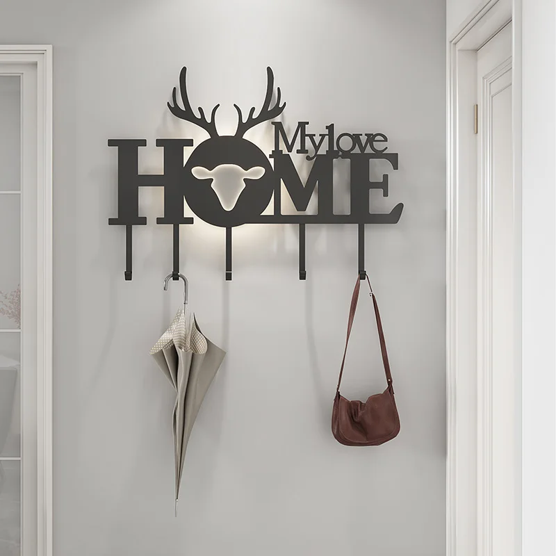 

Punch-free clothes hook creative entrance porch rack light luxury clothes hanger hanging clothes hook on the wall.