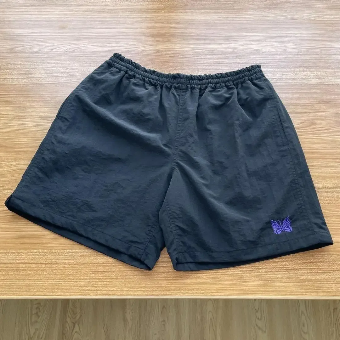 Benodigdheden AW vlinder geborduurd paar, retro losse rechte strand casual sneldrogende shorts, ultradun