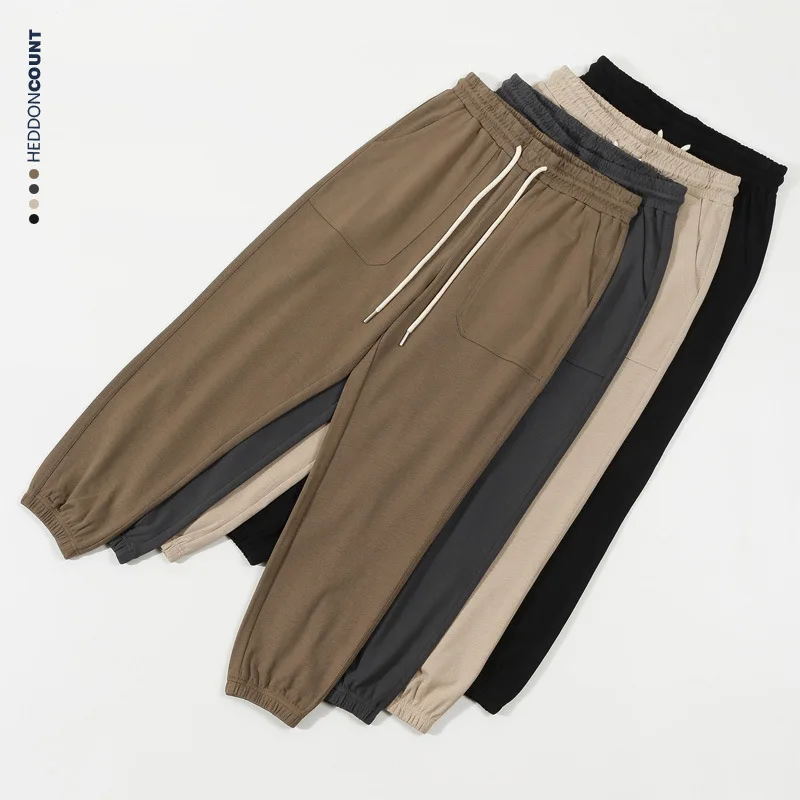 

Casual Loose Fit Straight Leg Cotton Sweatpants for Men And Women with Cuffed Bot Autumn Season Low Waist Youth Sle