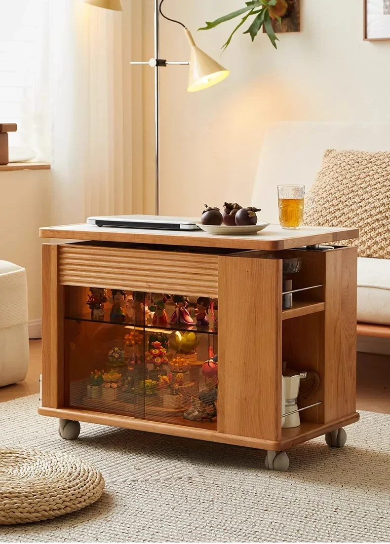 

Мобильная тележка из вишневого дерева, несколько чайных шкафов на диване и боковых шкафов для хранения.