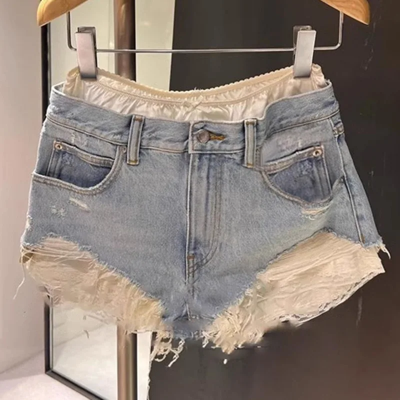 

2025 new niche to do old ripped raw edge jeans fake two pieces of patchwork shorts women short pants women