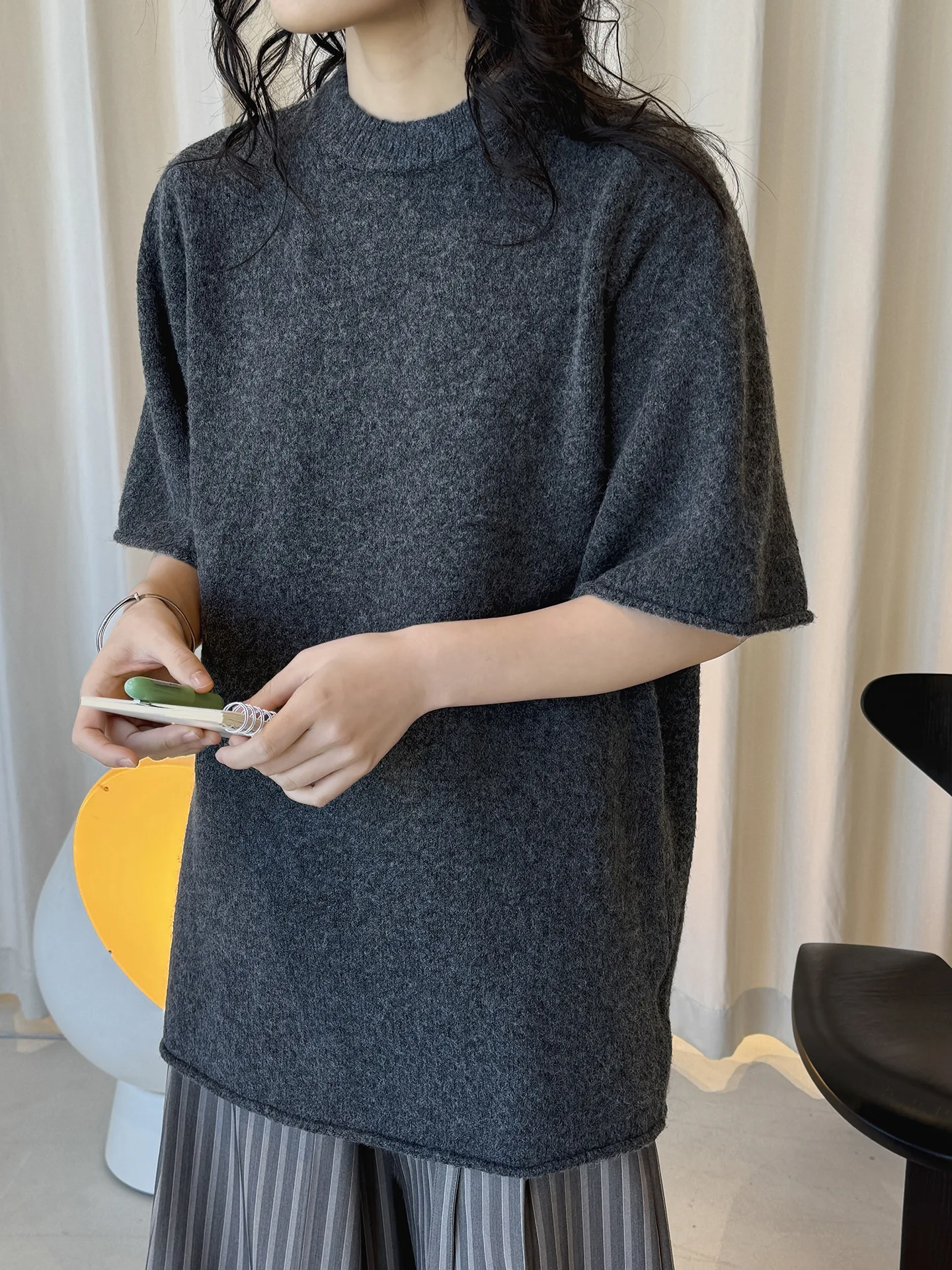 

Early spring new Korean style simple round neck knitted slightly curled edge sweater, soft and comfortable casual top for women