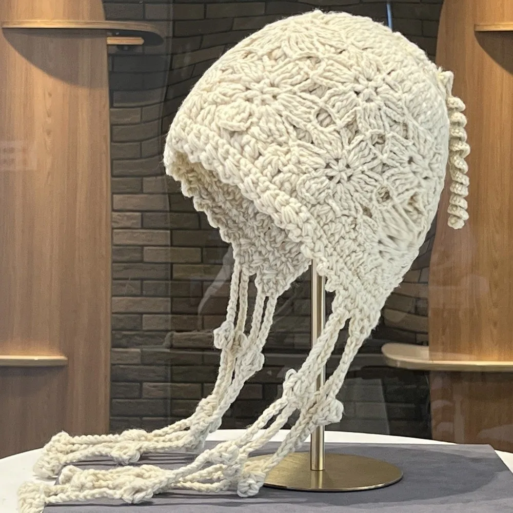 New Flower Knitted Crochet Hat with Tassels Hollowed Out Mesh Pullover Hat Braided Ear Protector Knitted Caps Outdoor