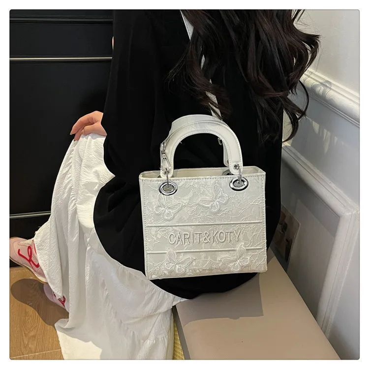 حقيبة حمل بتفاصيل فيونكة لعام 2025 للنساء، حقيبة عمل ذات سعة كبيرة مع فيونكة، حقيبة يد أنيقة، محفظة كمبيوتر محمول واسعة للتنقل