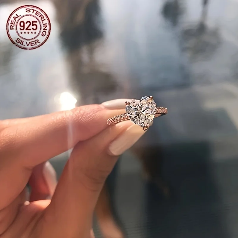 خاتم فاخر أنيق من الفضة الإسترليني عيار 925 على شكل قلب من الزركون للخطوبة والزفاف ونمط لامع للنساء