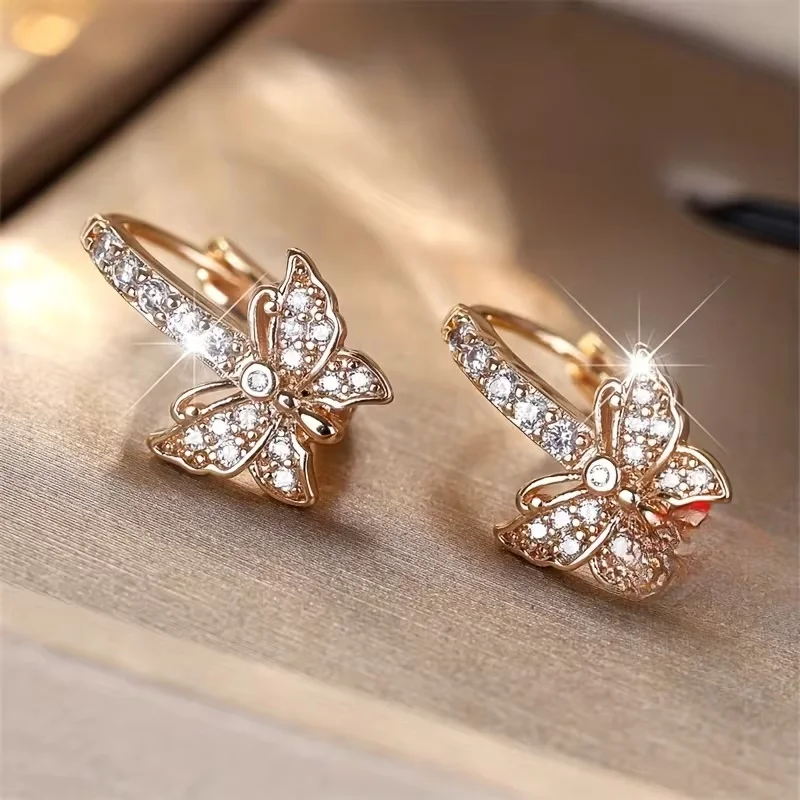 Luxurious and elegant butterfly-shaped earrings with artificial gemstones, suitable for daily casual wear.