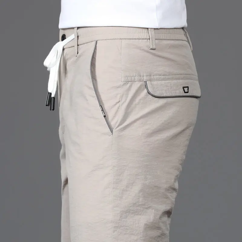 

Повседневные брюки из ледяного шелка, мужские облегающие прямые вертикальные ультратонкие брюки, летние тонкие дышащие быстросохнущие однотонные брюки