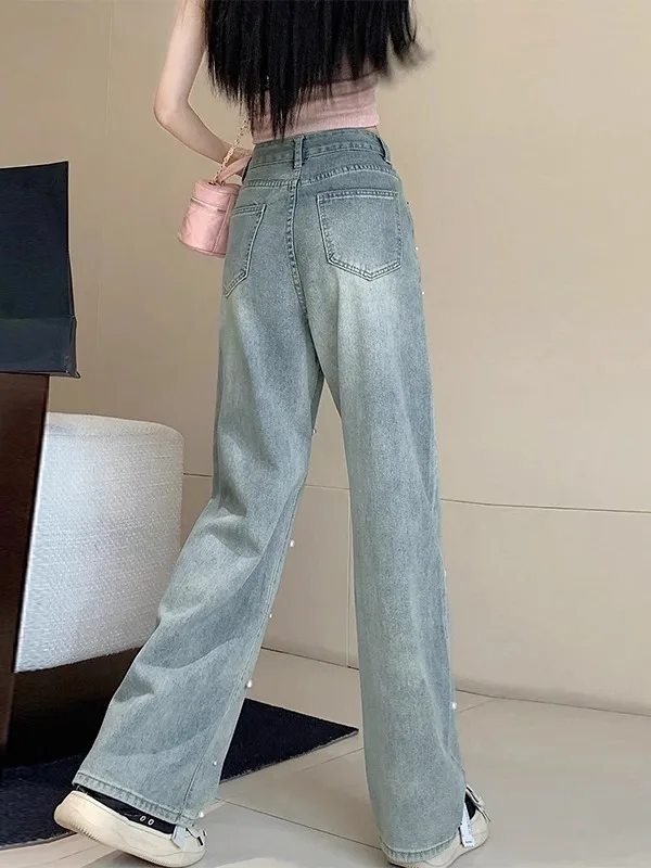 بنطلون جينز نسائي أنيق على الطراز الكوري مزين باللؤلؤ واسع الساق ضيق القص صيفي عصري مستقيم الساق