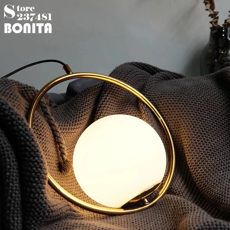 

Simple Gold brass Ring pendant lighting for restaurants Milky glass ball Planet cord pendant light