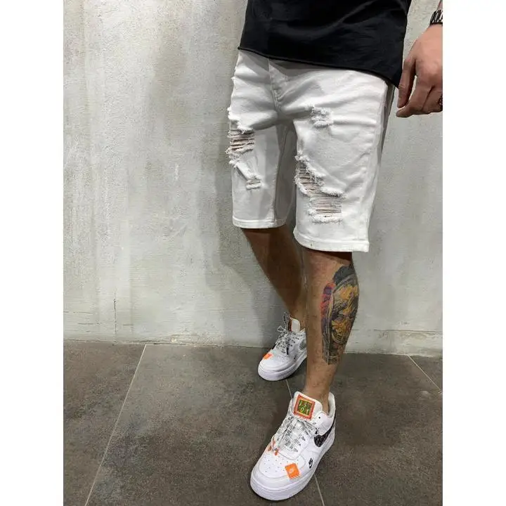 2024 Ripped tassel denim shorts New Summer Men\'s Personalized Washable Perforated Denim Pants Large Casual Middle Pants