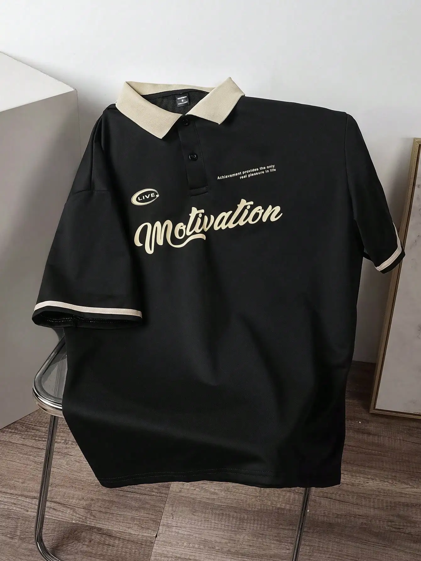 

Black Loose Fit Polo Shirt with Contrast Collar and Script Graphic