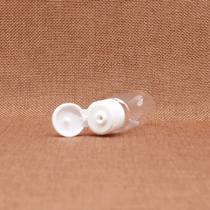 Botella de plástico con tapa abatible de 50ml, loción cosmética vacía de 50g para uso en viajes, contenedor recargable, rosa, azul y marrón