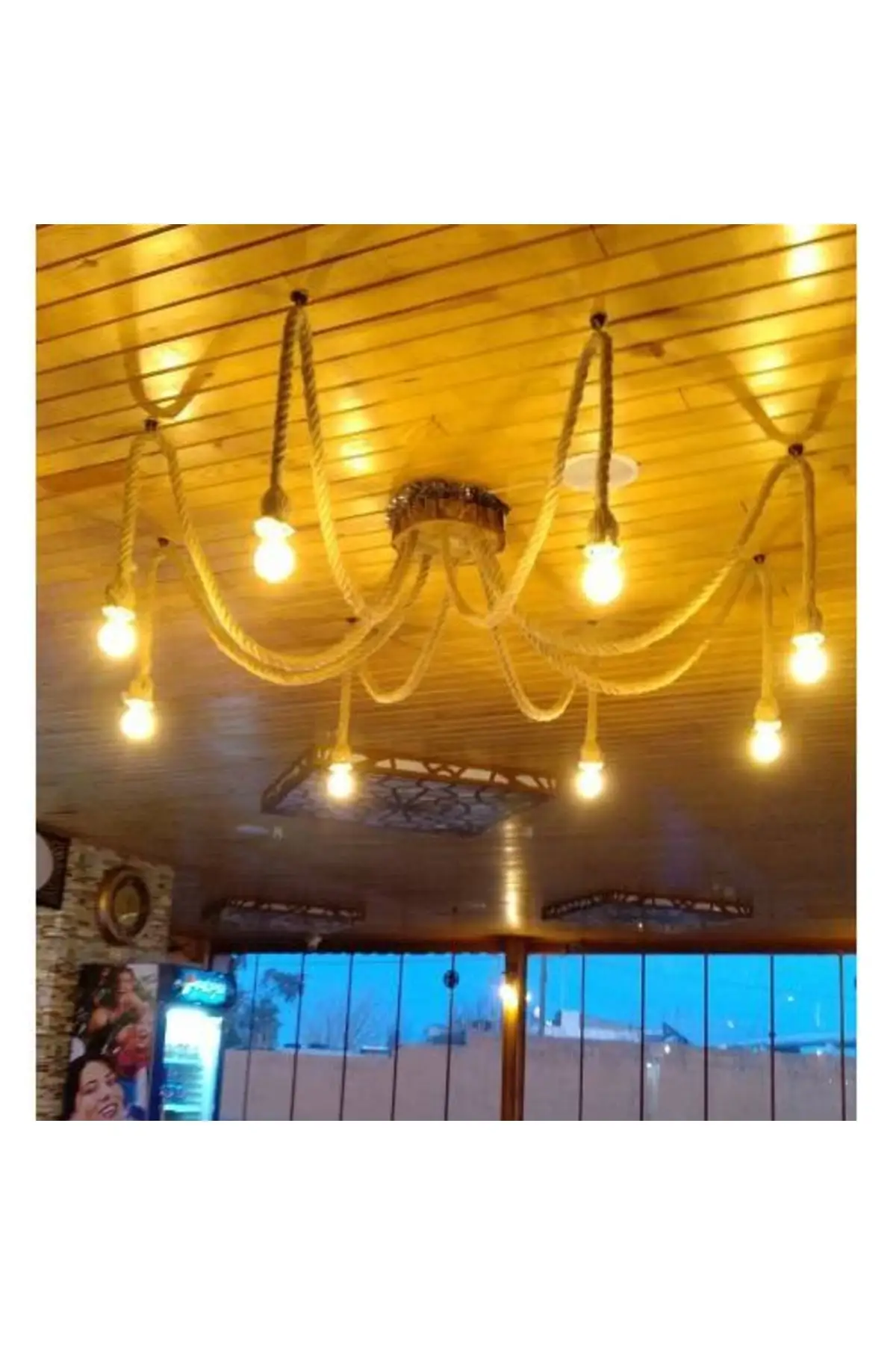 

Wooden chandelier with rope chandelier. Rope