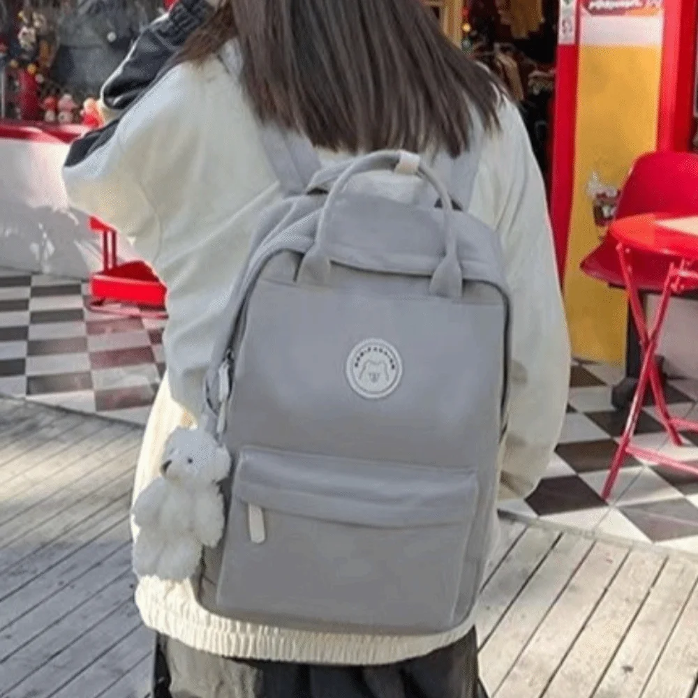 Solid Large Capacity Student Backpack Zipper Nylon Academy Girl's School Bag Multi-Pocket Spacious Plush Pendant Teens Rucksack