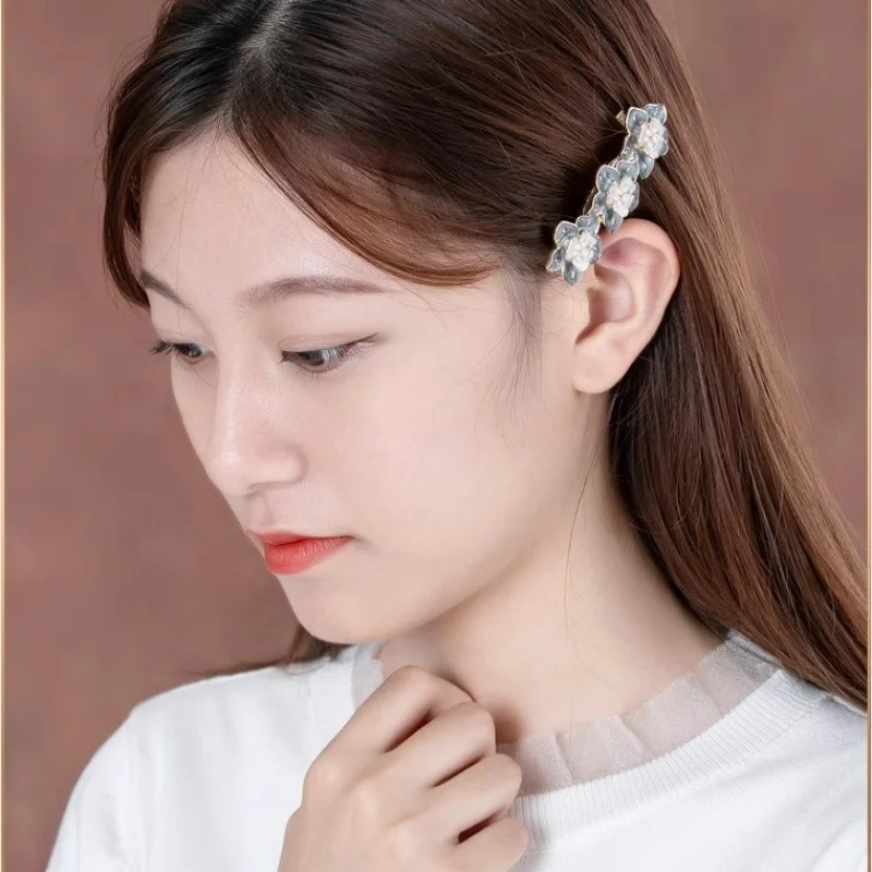 New Korean version of pearl camellia spring hair clip retro crystal edge clip side clip female fashion casual hair accessories