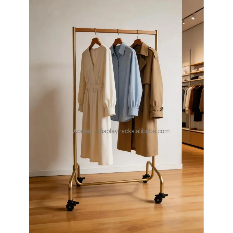 custom.New Design Golden Stainless Steel Display Rack With Wheels Durable Display Stand Garment Shop Easy Move Display Rack