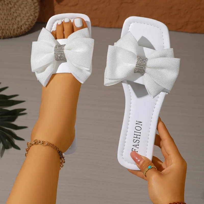 

2026 Summer New Women's Bow Flat Slippers Design Comfortable Casual Slippers Outdoor Non Slip and Wear Resistant Flat Sandals