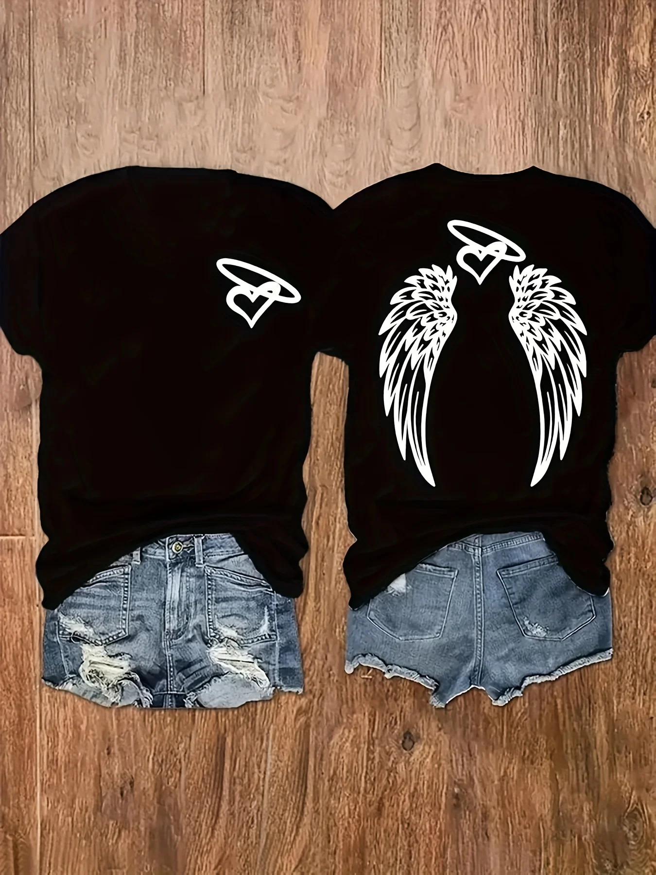 

Plus - Size Black Round Neck T - Shirt with Angelic Wings and Heart Motif Print: Mystical and Graceful
