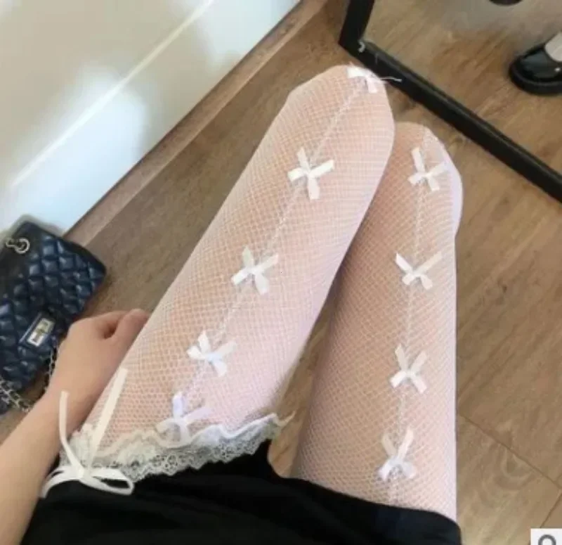 Kawaii Gothic Aushöhlen Strumpfhosen Lolita Bogen Knoten Fishnet Strümpfe Frauen Spicy Girl Schwarz Weiß Sexy Dünne Ins Flut Spitze Strumpfhosen – Detail 1