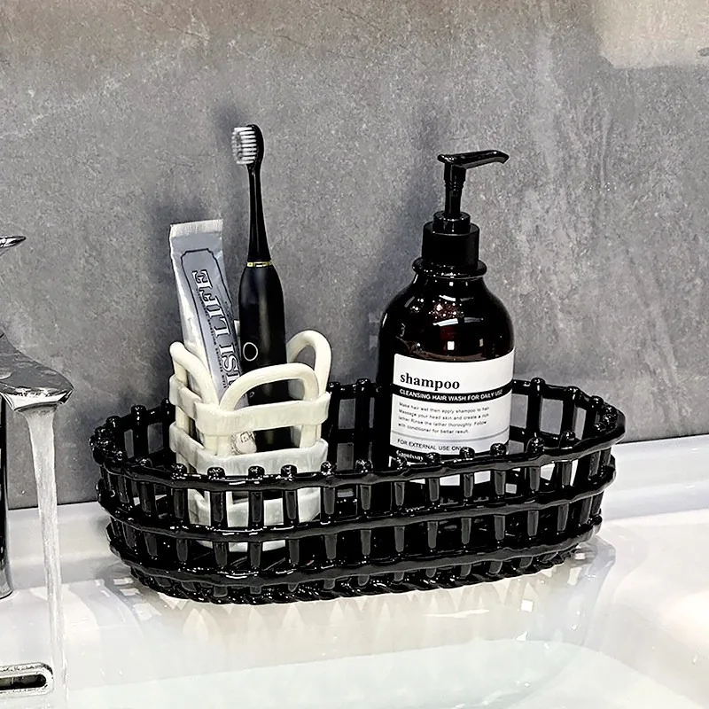 Storage basket, bathroom countertop, premium hand sanitizer, toothpaste, toothbrush, shelf, storage cylinder.