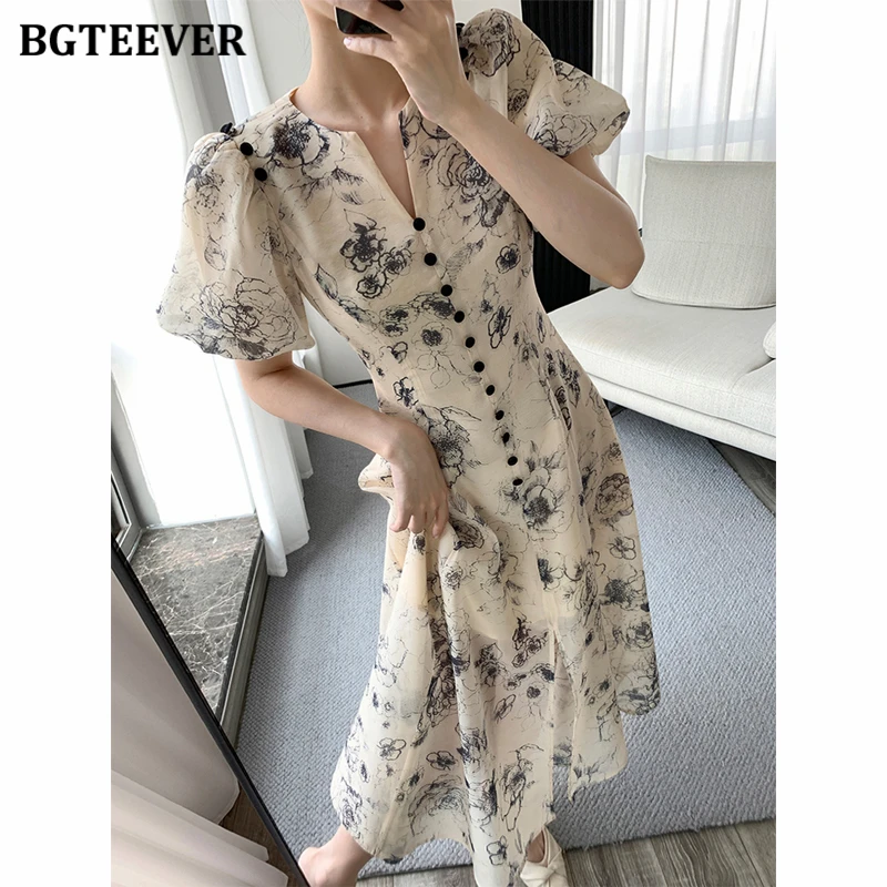 فستان BGTEEVER أنيق برقبة على شكل حرف V وخصر نحيف مزين بالزهور للنساء للربيع والصيف وأكمام منتفخة مطبوعة على شكل حرف a فستان نسائي