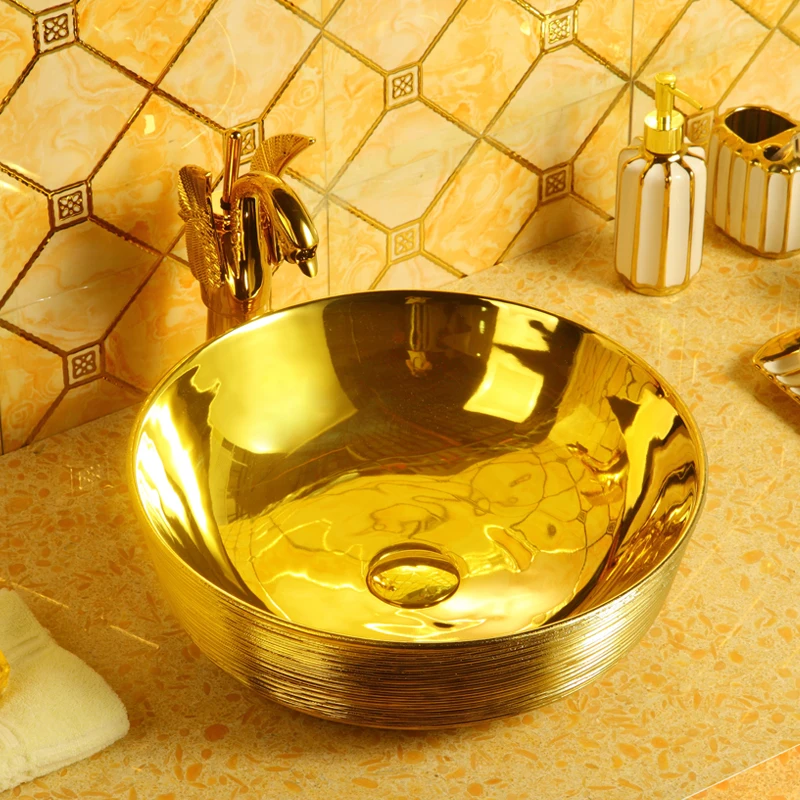 

The product can be customized.New brushed gold washbasin home luxury gold washbasin washbasin Round European retro