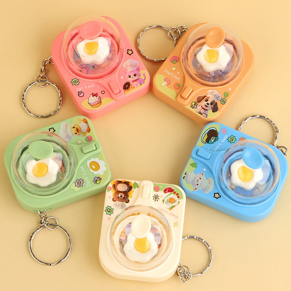 ZAKOL Mini volteador de huevos de dibujos animados, divertida máquina creativa para huevos fritos, llavero antiestrés, juguete de presión para pasar el tiempo, colgante