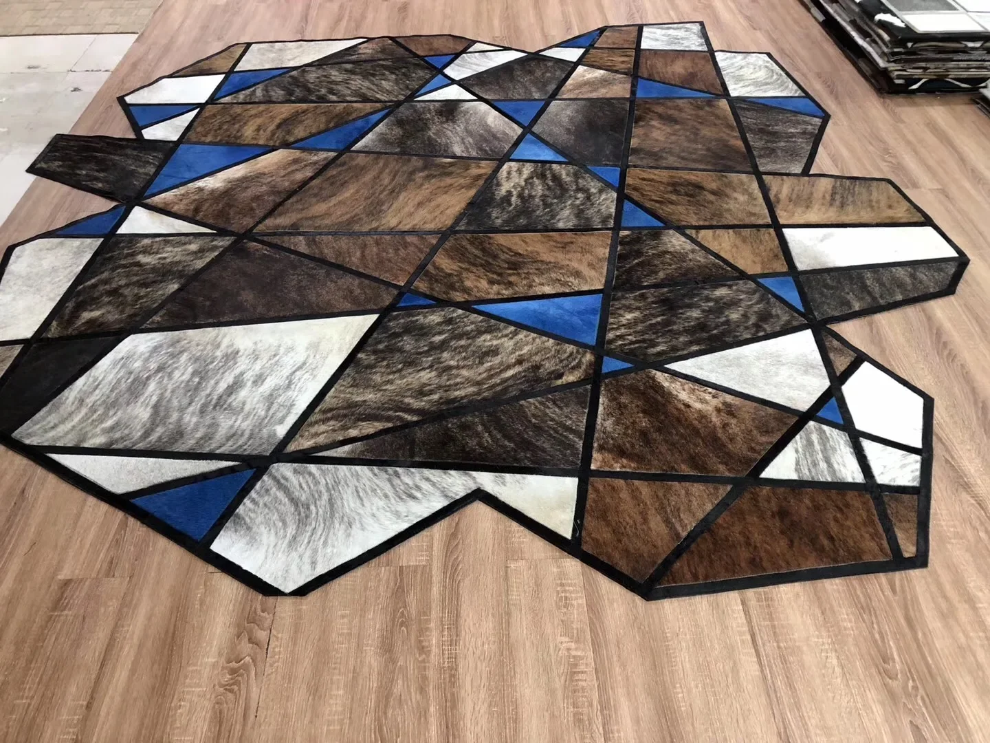 

Irregular Brown And Grey Patchwork Cowhide Rug With Blue Pieces Cow Hides Decor CR-53
