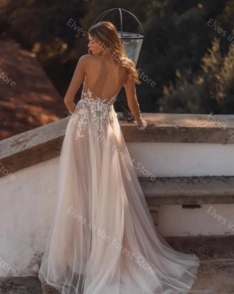 Abiti da sposa vintage in tulle Collo trasparente Applicazioni in pizzo Perline Abiti da sposa Maniche lunghe Abiti da sposa personalizzati senza schienale