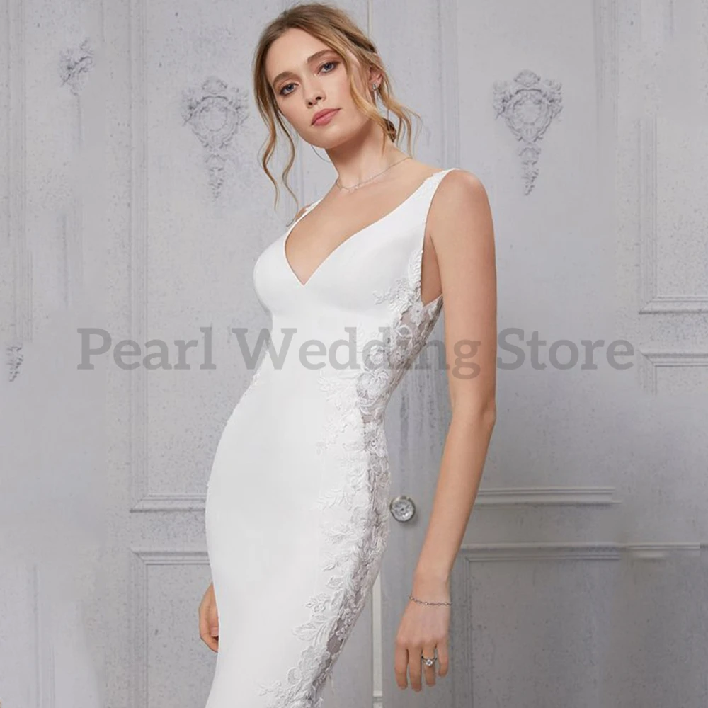 Elegant Wedding Dresses V-Neck and Backless Appliques Illusion High Quality Sweep Train Mermaid Bridal Beach Seaside Gowns