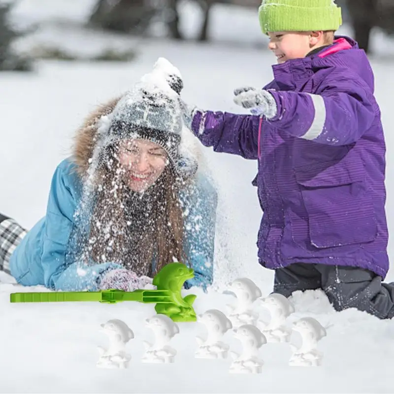 子供のためのイルカの形をした雪のボール、面白いクリップ型、雪の遊びのおもちゃ、屋外の雪のボール、戦いのゲーム、冬