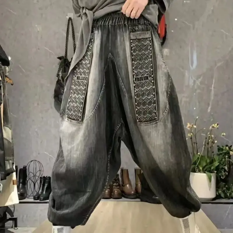 Calças de brim femininas soltas casuais algodão denim grande bolso tornozelo comprimento calças rebite design harem calças 2025 novo outono estilo streetwear