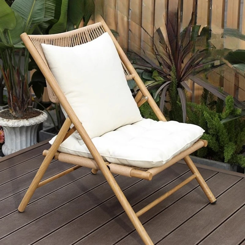 

Balcony small tables and chairs, reading and drinking tea leisure chairs, new Chinese folding recliner rattan chairs, courtyard