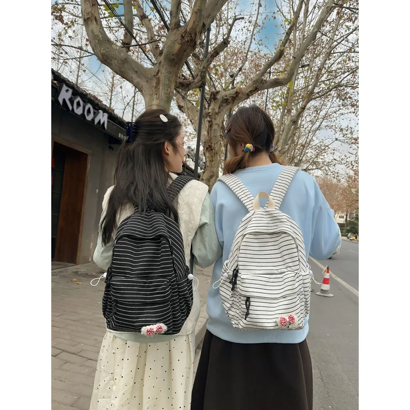 

Korean-style striped backpack for female students, junior high school schoolbag, large-capacity cute backpack, unisex travel bag