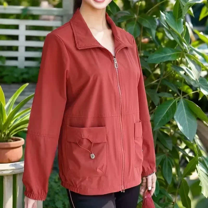 Abrigo holgado de manga larga para mujer, prenda de Color liso con cuello tipo Polo y bolsillos con cremallera, con cordones, a la moda, para otoño