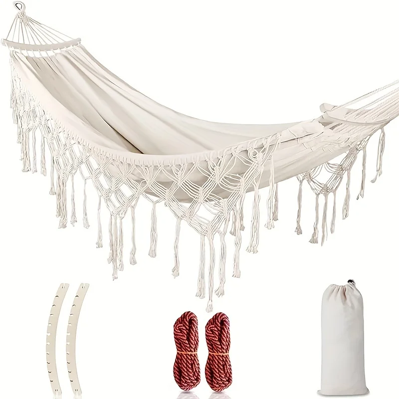 Close-up of natural cotton macrame fringe swing details