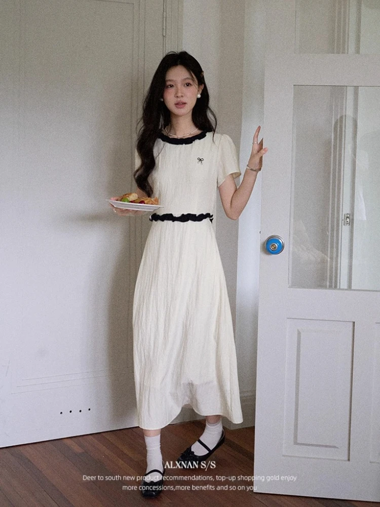 ALXNAN Beige Short Sleeve Dress with Bow Detail Black Lace Trim Pearl Buttons Waist-Defining A-Line Silhouette Summer DYL661967